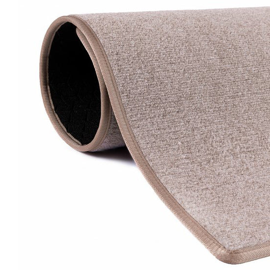 Beige dörr- och hallmatta.