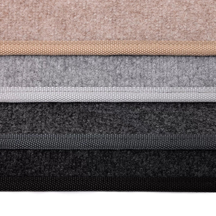 Termomatta med kantade kanter i fyra olika färger.